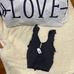 Brand new with tags crop top. Size M